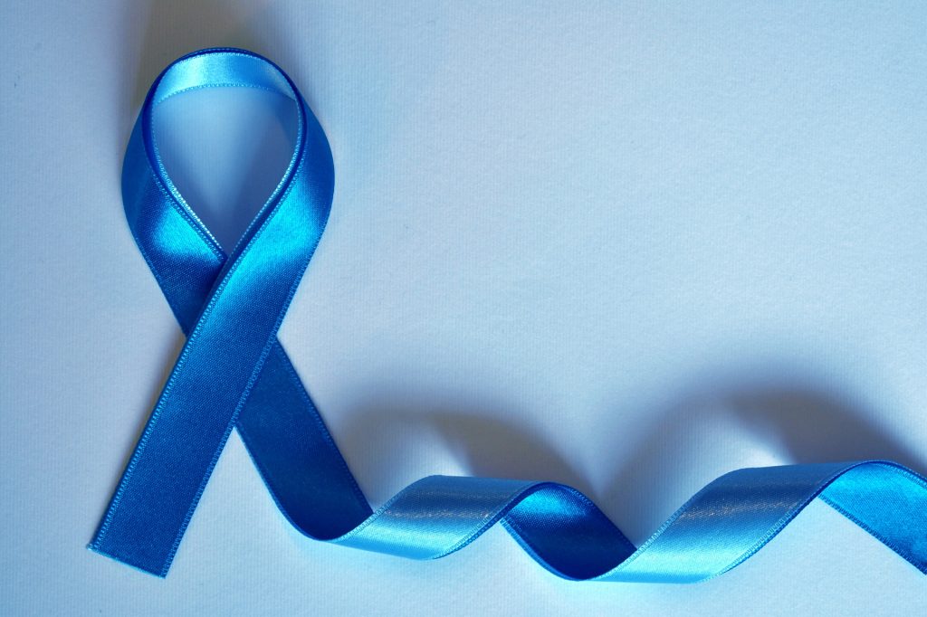 A blue cancer ribbon